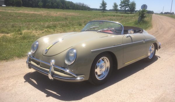 beige speedster on road